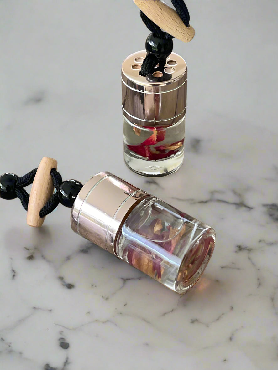 Elevate your drive with our luxurious rose gold car diffuser, designed for long-lasting, flameless fragrance on the go. Stylish and refillable, it effortlessly clips onto your air vent, releasing soothing essential oil scents for a fresh, relaxing ride. Perfect for cars, travel, and everyday freshness! 🚗✨🌿