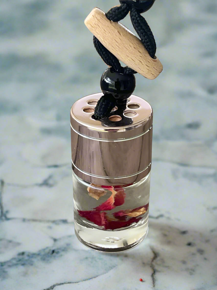 Elevate your drive with our luxurious rose gold car diffuser, designed for long-lasting, flameless fragrance on the go. Stylish and refillable, it effortlessly clips onto your air vent, releasing soothing essential oil scents for a fresh, relaxing ride. Perfect for cars, travel, and everyday freshness! 🚗✨🌿